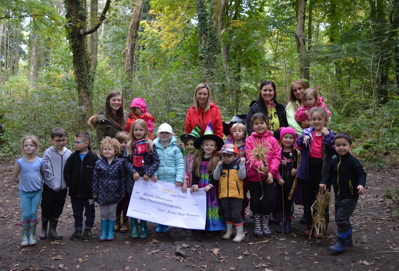 Scottish Roads Partnership presented Muddy Adventures with a bumper cheque for £1,000 from its Good Neighbour Fund