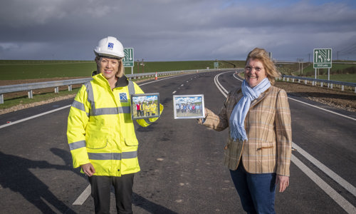 Transport Minister Jenny Gilrith standing with community members at the Maybole Bypass opening